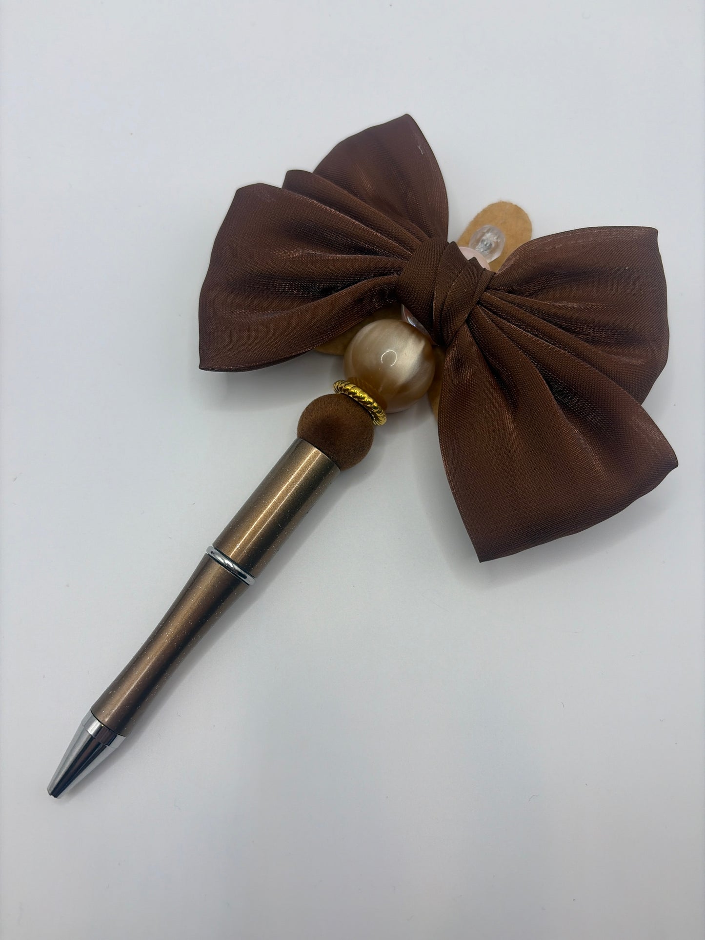Brown flower with bow