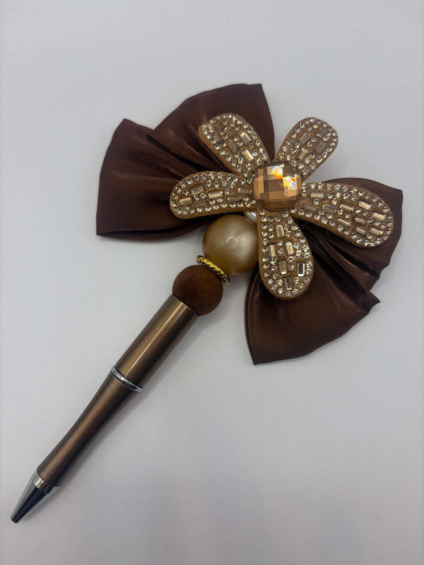 Brown flower with bow