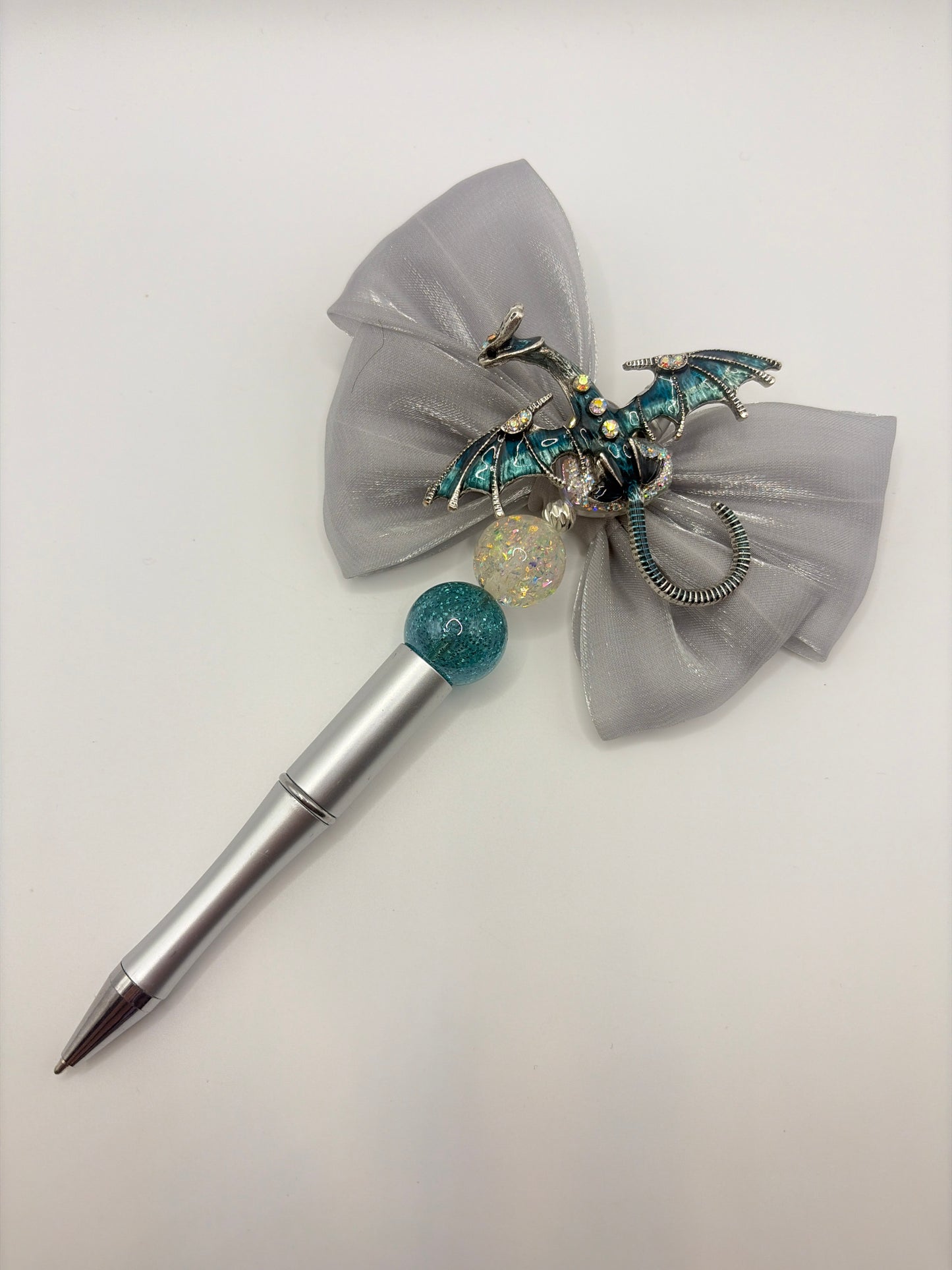 Dragon pen with grey bow